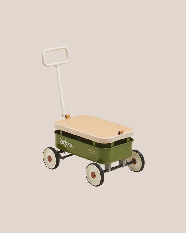PULA-Wild 3-in-1 kids wagon in olive green with wood lid, white handle, tan wheels, and Kidpop logo.