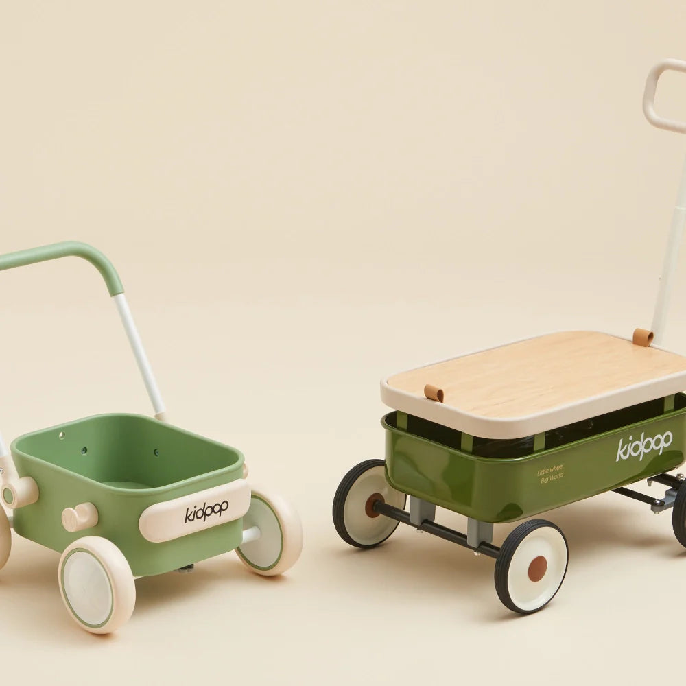 Two Kidpop wagons in light and dark green on a beige background.